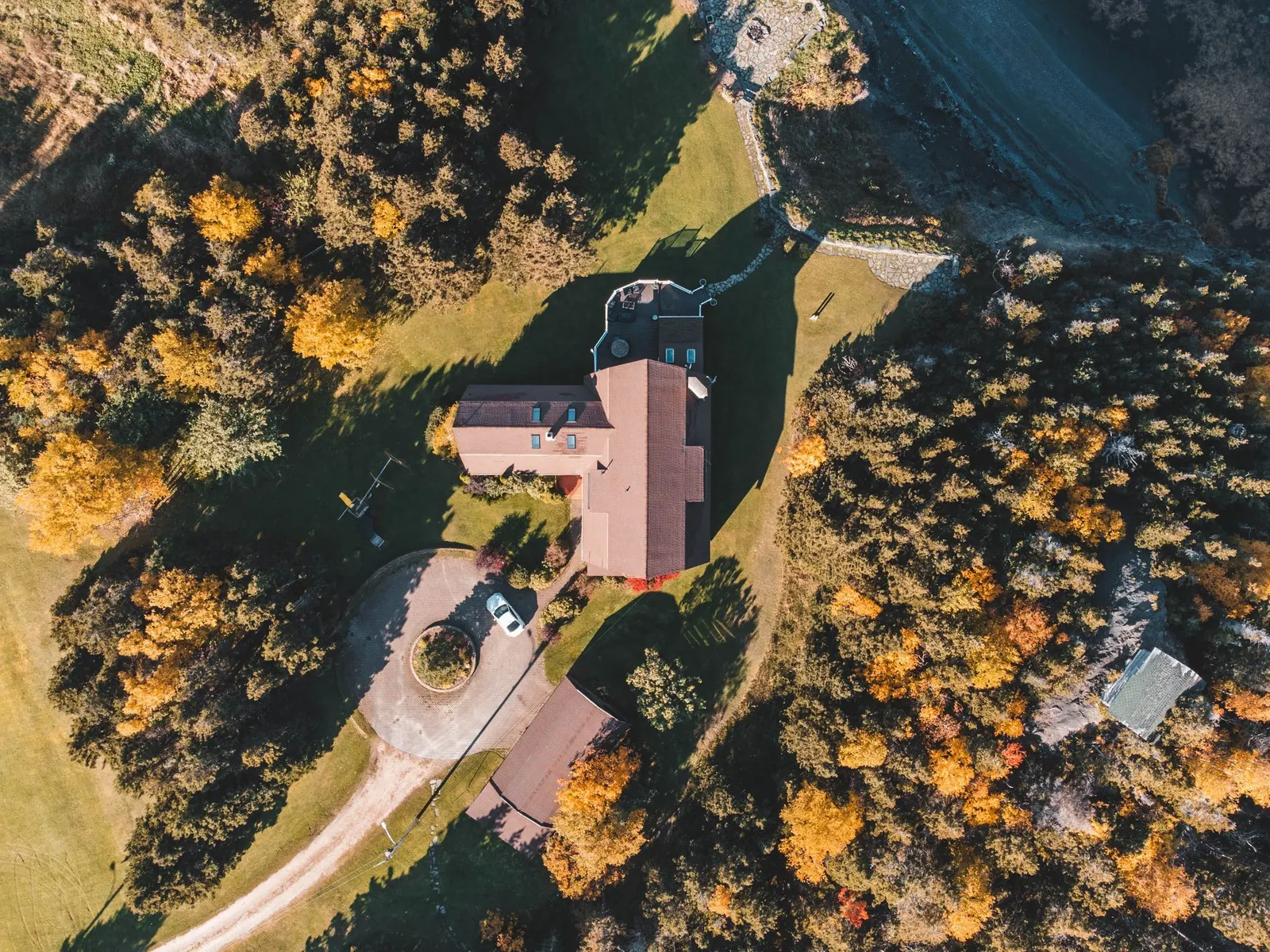 Aerial view of a country home in autumn (sample image)