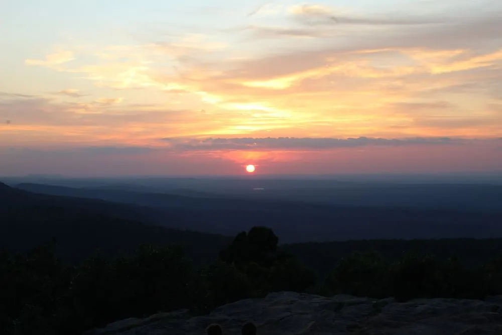 Sunset over a forested Arkansas ridge, photographed by Michael at 2819 Photography