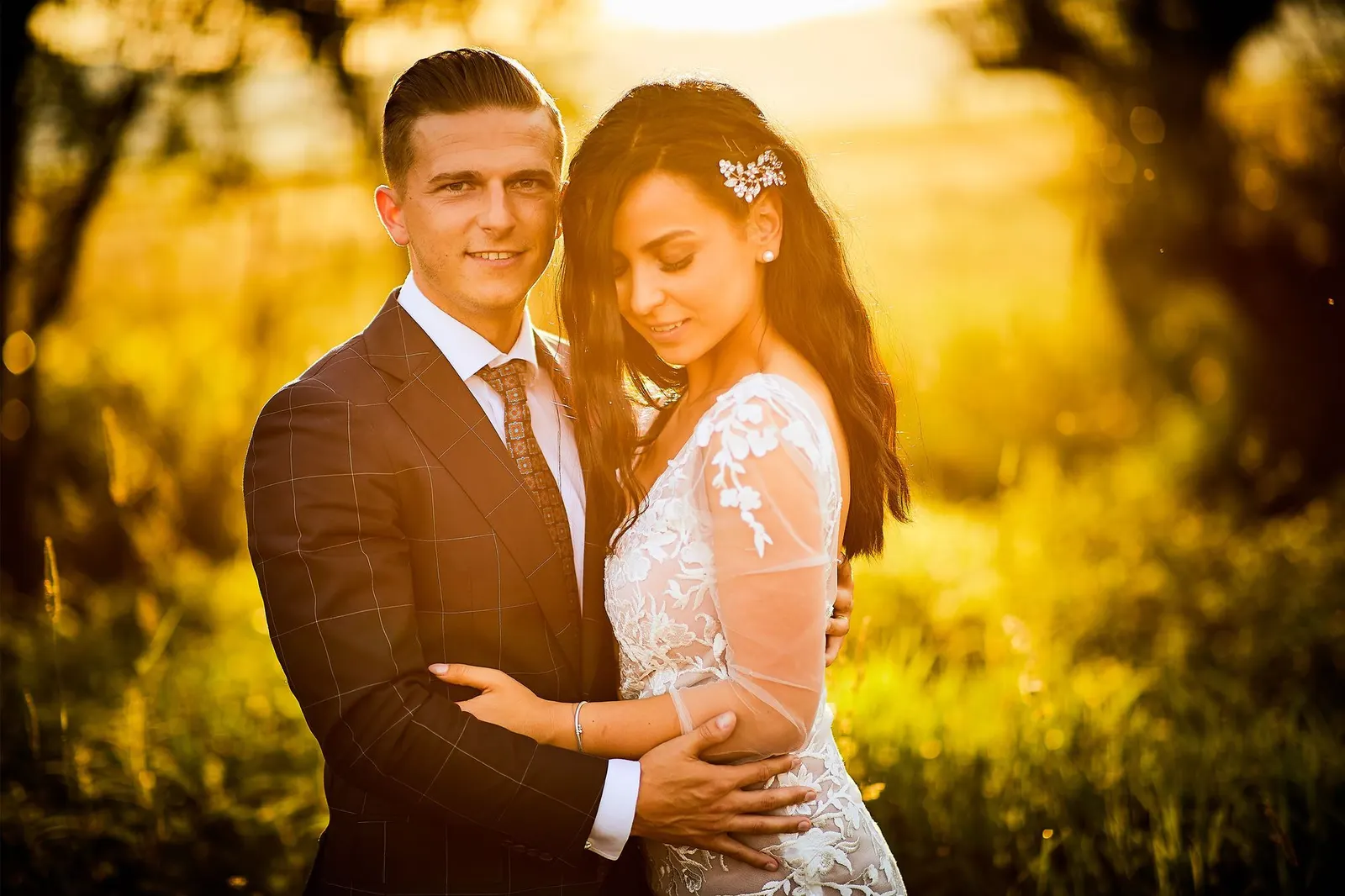 Bride and groom portrait in warm sunset light (sample image)